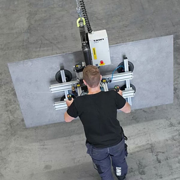Metal  being lifted with a vacuum lifter