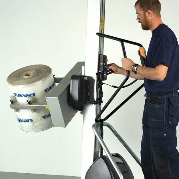 Rotating Reels and rolls with an ergonomic electric lift assist