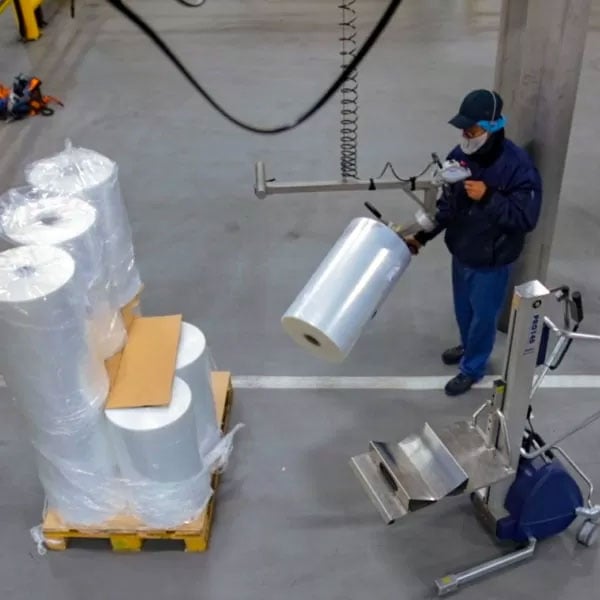 Lift and Tilt Reels or rolls with ergonomic electric lift assists and vacuum lifting technology