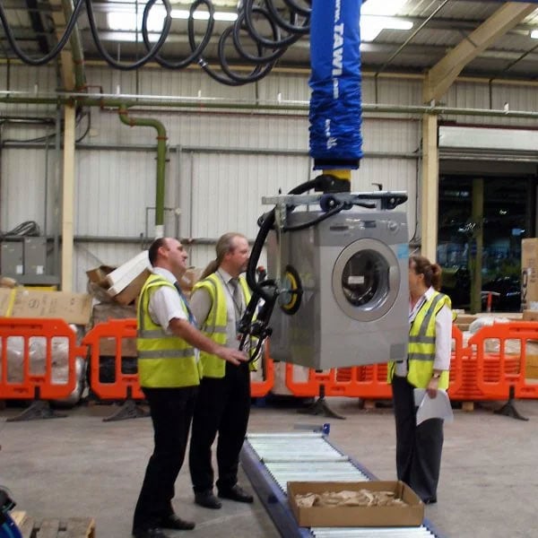 Home Appliances being lifted by a single operator using a vacuum lifter
