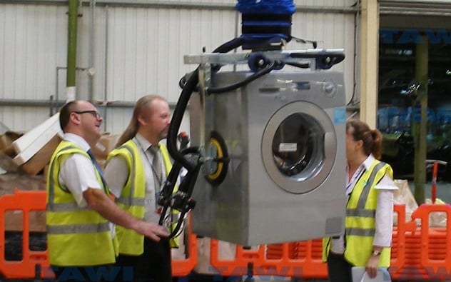 TAWI lifting solutions can help handle heavy, compact bathroom products in confined production or warehouse spaces. 