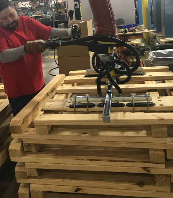 TAWI vacuum lifters can be added into existing layouts to help operations improve their material handling process of pallets. 
