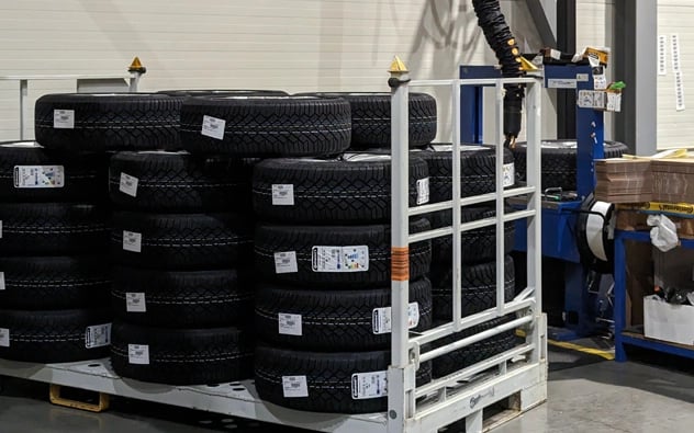 TAWI tire lift assembly