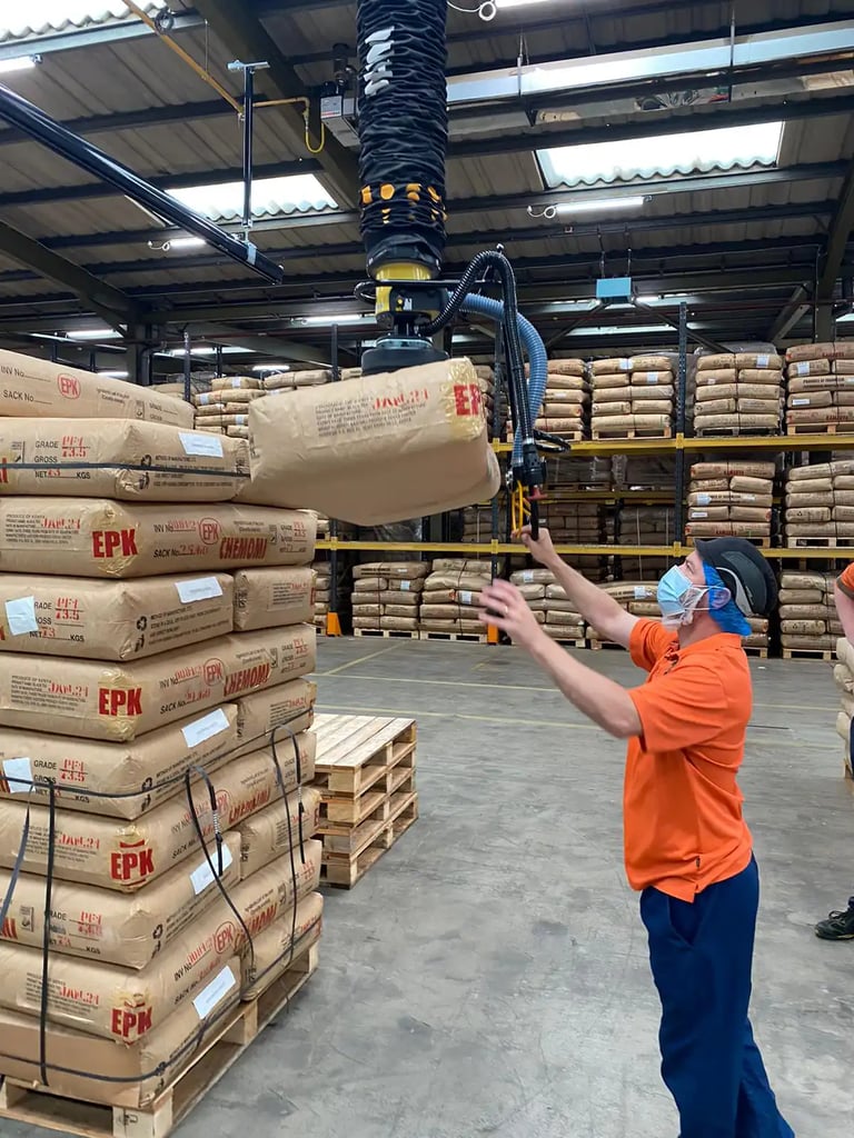 Semi-automated material handling of sacks in a warehouse