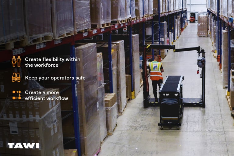 A person moves the Container Unloader around a facility.