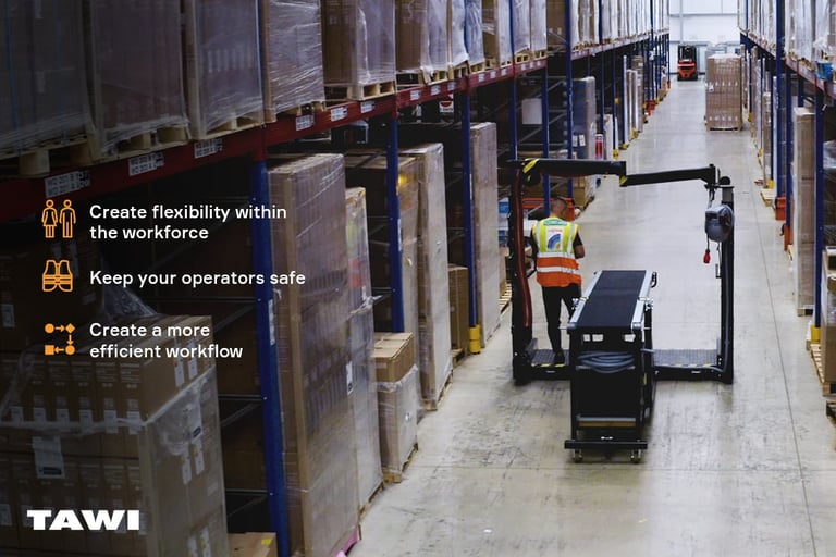 A person moves the Container Unloader around a facility.