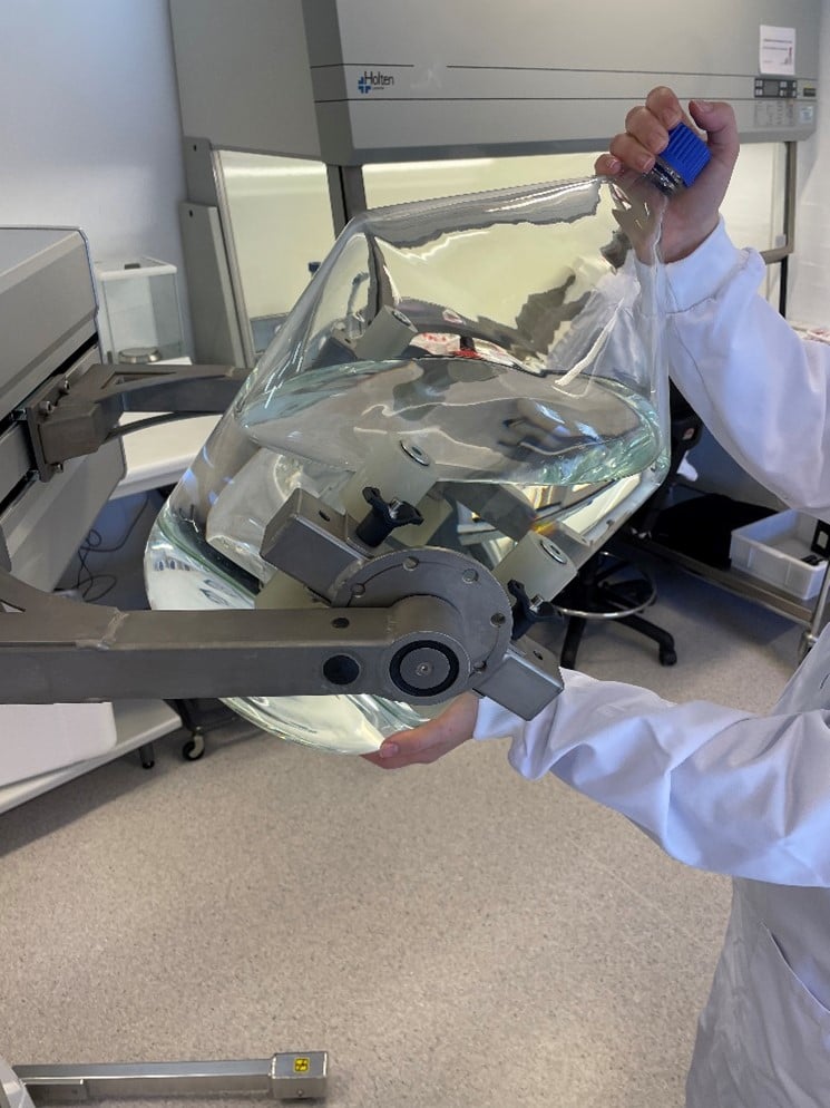 TAWI customised lifting trolley to rotate heavy bottles in pharma