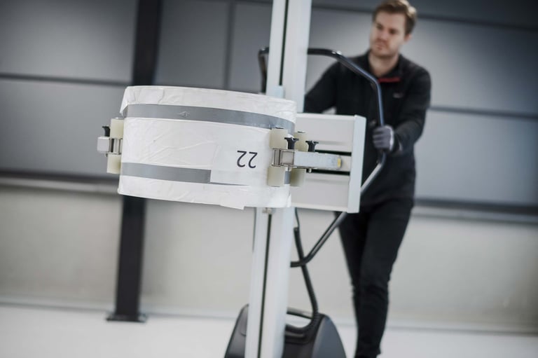 Pick and move reels from pallets with smart reel lifting equipment