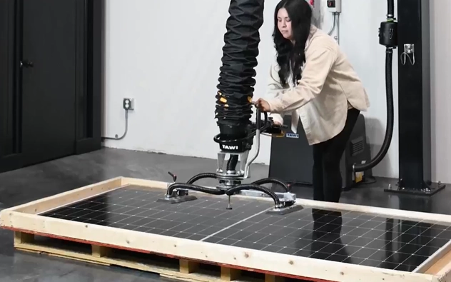 Incoming deliveries of solar panels require careful unloading and movement to prevent transit damage.