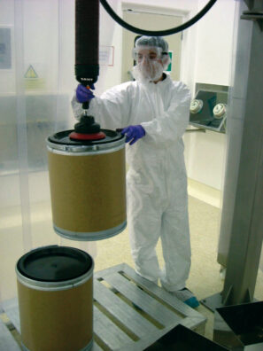 Lifting drums from a pallet with vacuum lifter in cleanroom environment