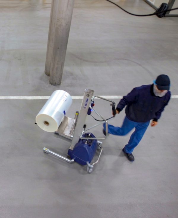 lifting trolley holding roll of packaging film