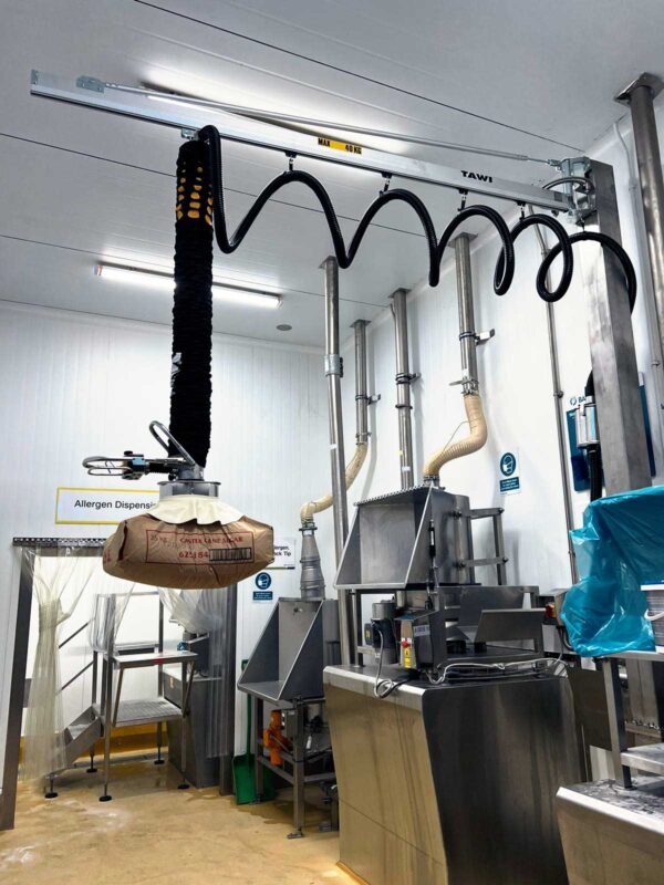 Stainless vacuum lifter lifting a sack of food