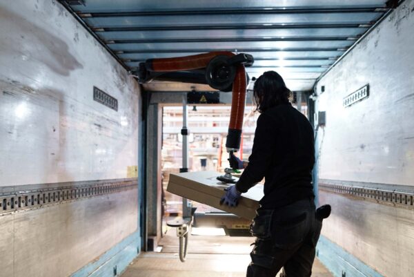 Man unloading a container at Postnord