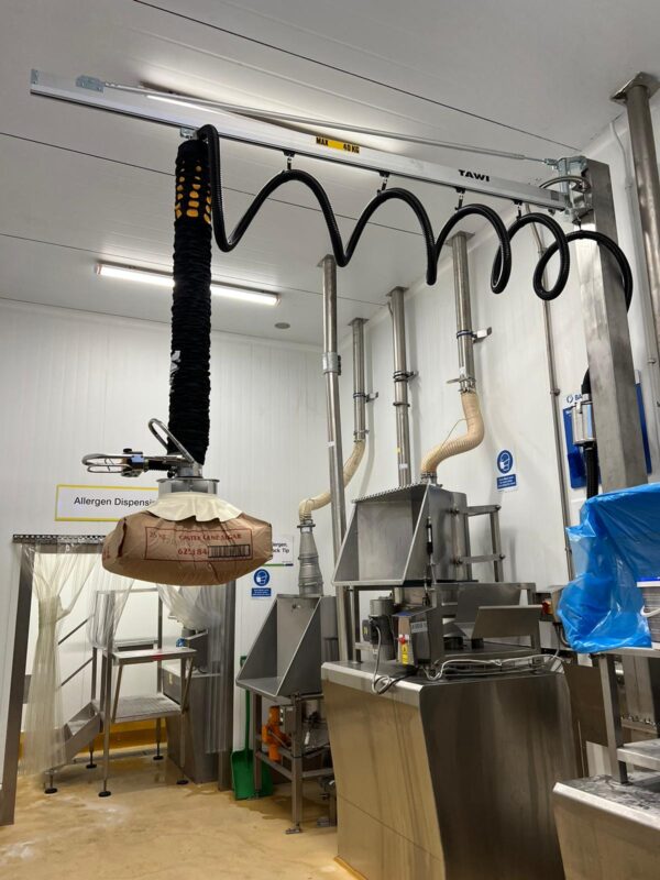 Movable vacuum lifter lifting bags in a sensitive environment